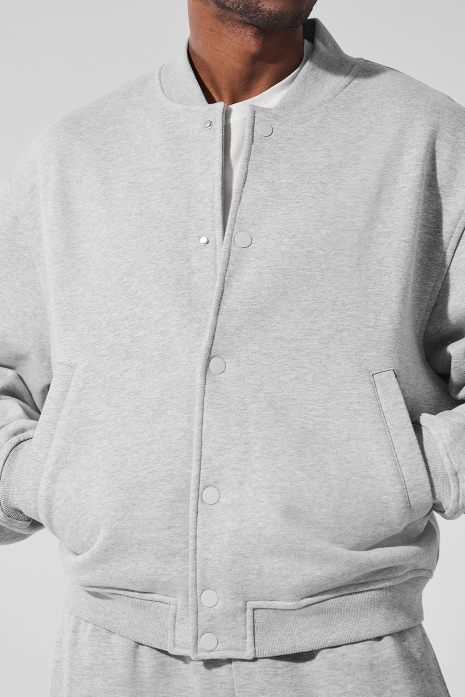 Close-up of the front slip pockets on the custom varsity jacket