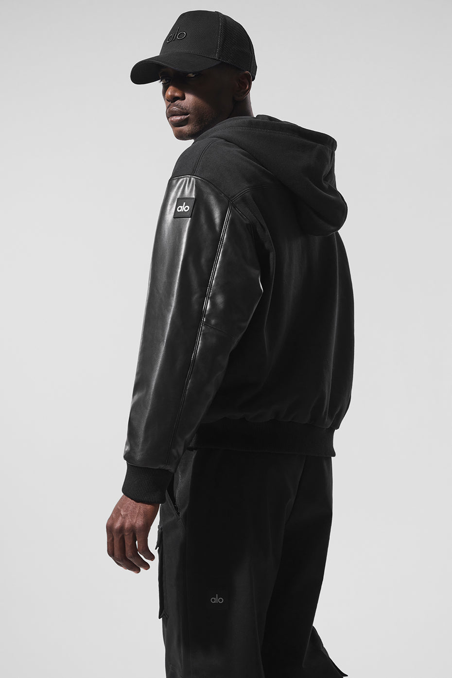 Back angle of mens outerwear jacket styled for city wear
