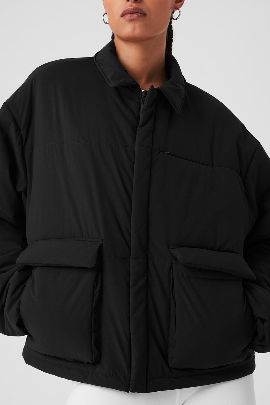 Front view of mens utility jacket featuring flap pockets and zip collar