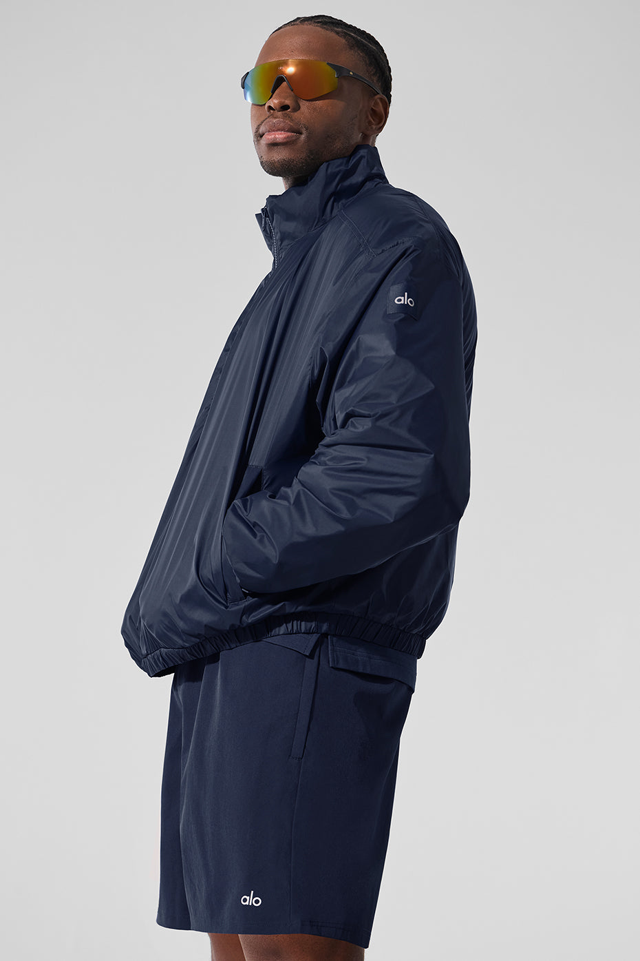Model wearing the half zip pullover sweatshirt during a rainy run.