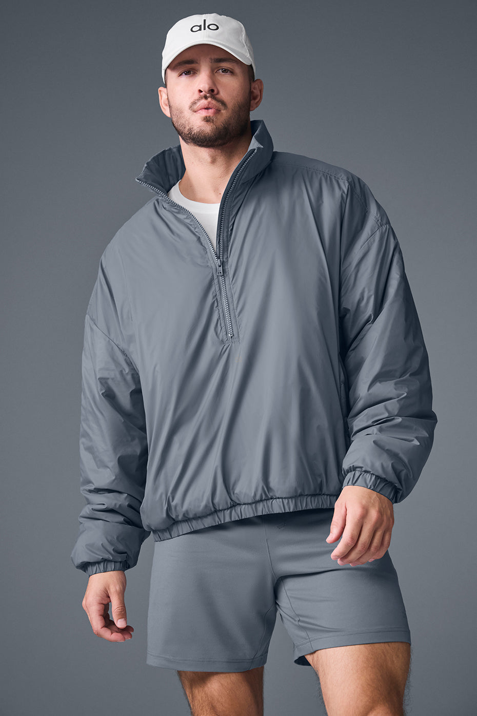 Front view of steel grey lightweight pullover worn during a morning run