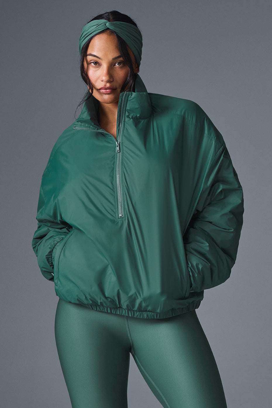 Front view of the Latitude lightweight half-zip running jacket in Winter Ivy.