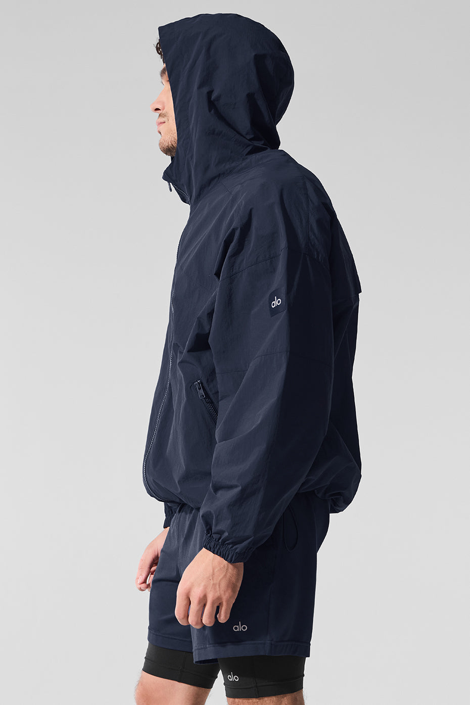 Front view of the Vantage Performance Track Jacket in navy, ideal for running.