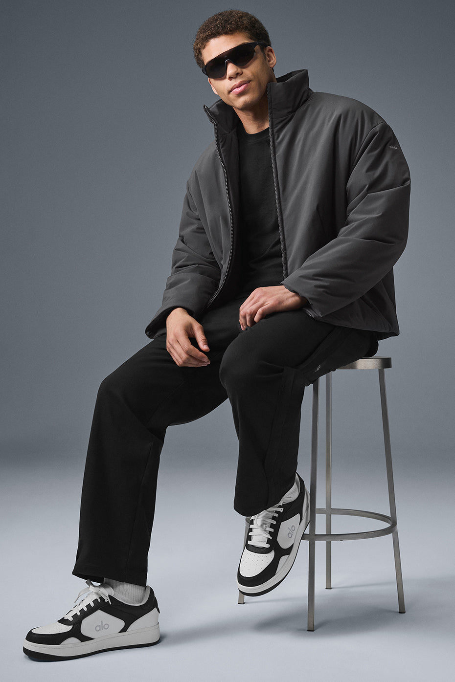 Close-up of jackets textured fabric and stand-up collar