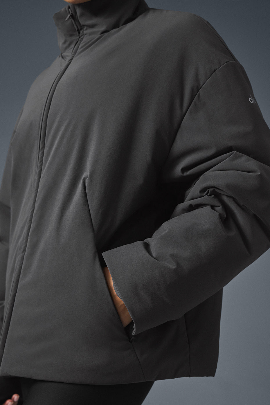 Lightweight jacket with lined pockets, perfect for winter wear.