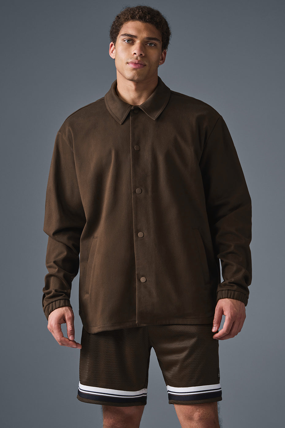Front view of the espresso suede bomber jacket for men.