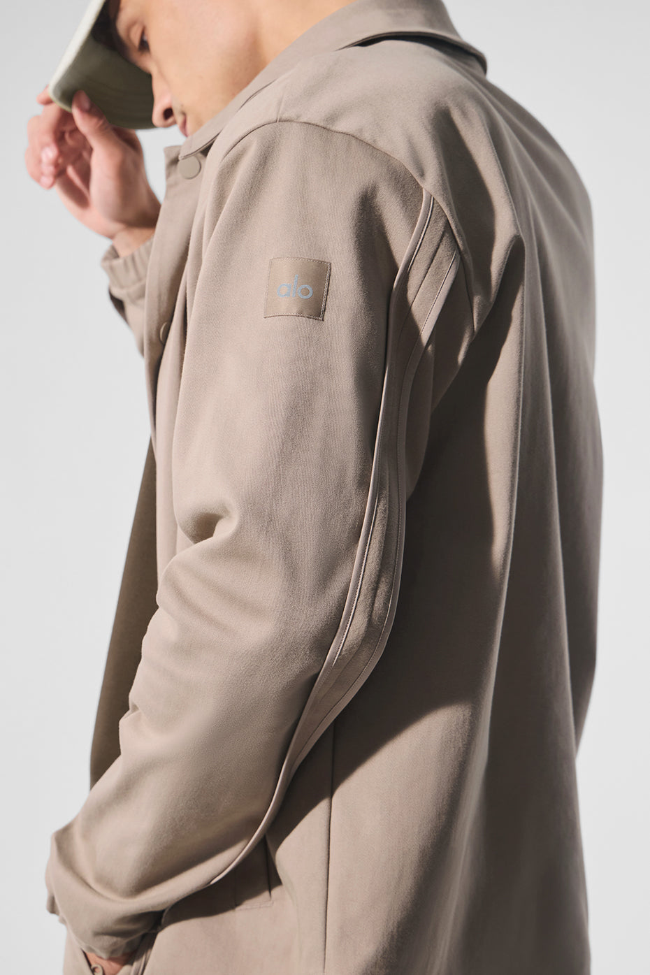 Styled outdoor look with the suede jacket layered over a casual shirt