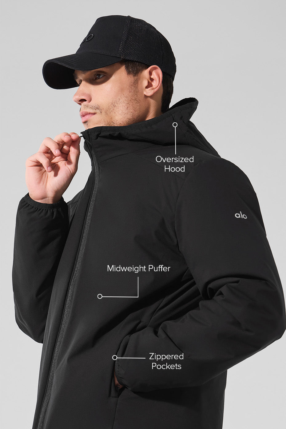 Side angle of the mens black puffer jacket, perfect for outdoor wear.