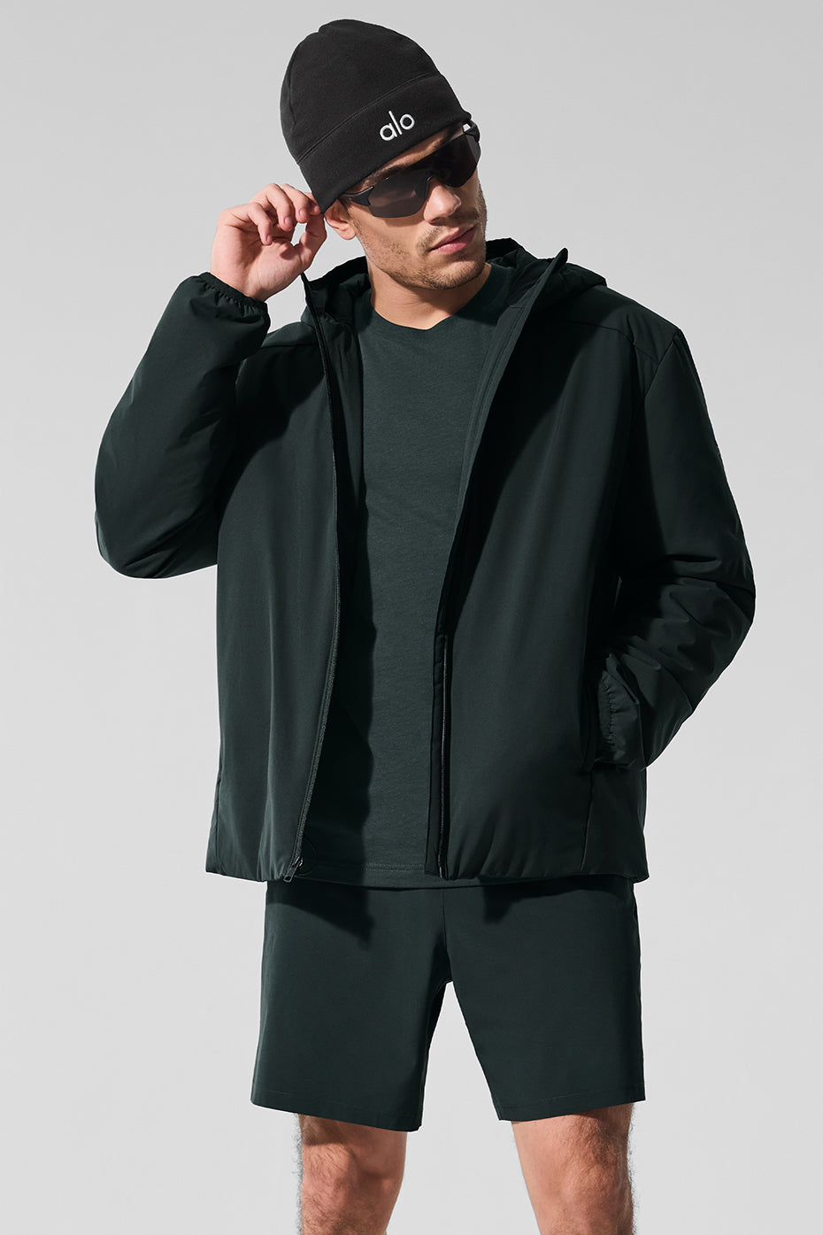Close-up of the Elemental full zip jacket in Charcoal Green, highlighting the zipper and fabric texture
