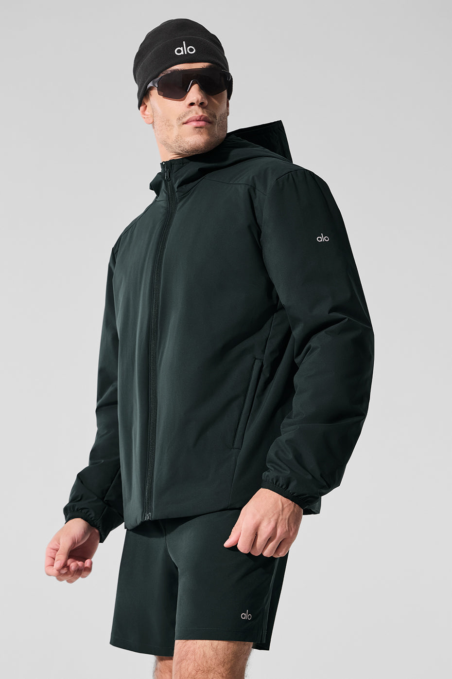 Close-up of the Elemental full zip jacket in Charcoal Green, highlighting the zipper and fabric texture