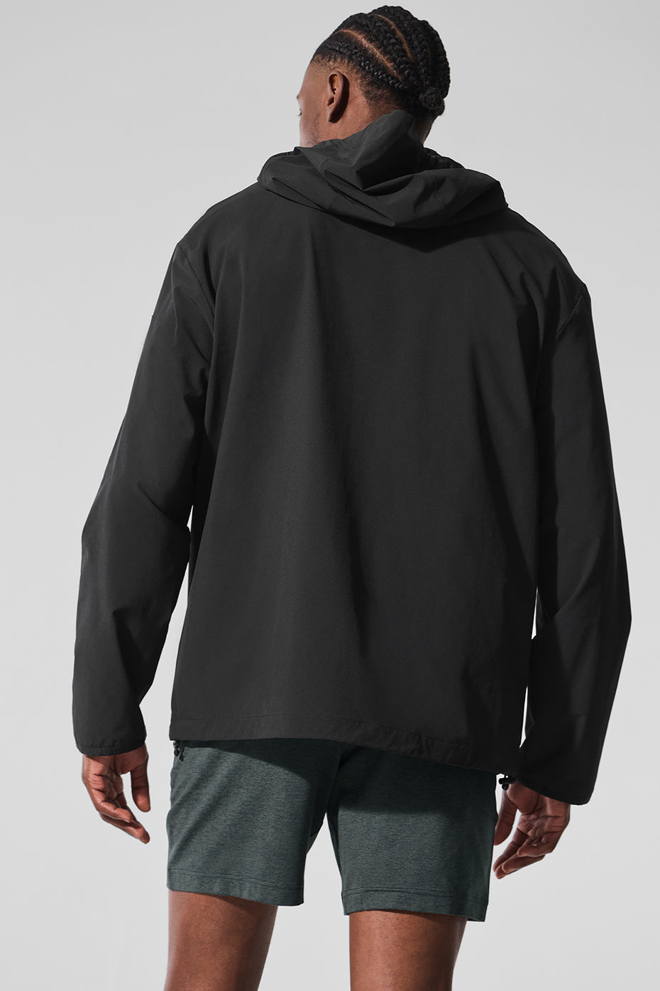 Back view of the versatile performance jacket showing its sleek design.