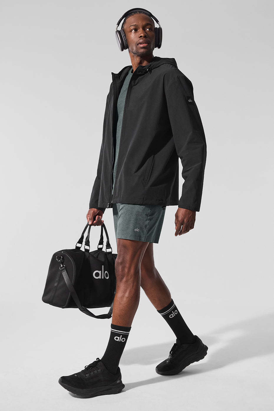 Front view of the moisture-wicking jacket in an urban setting.