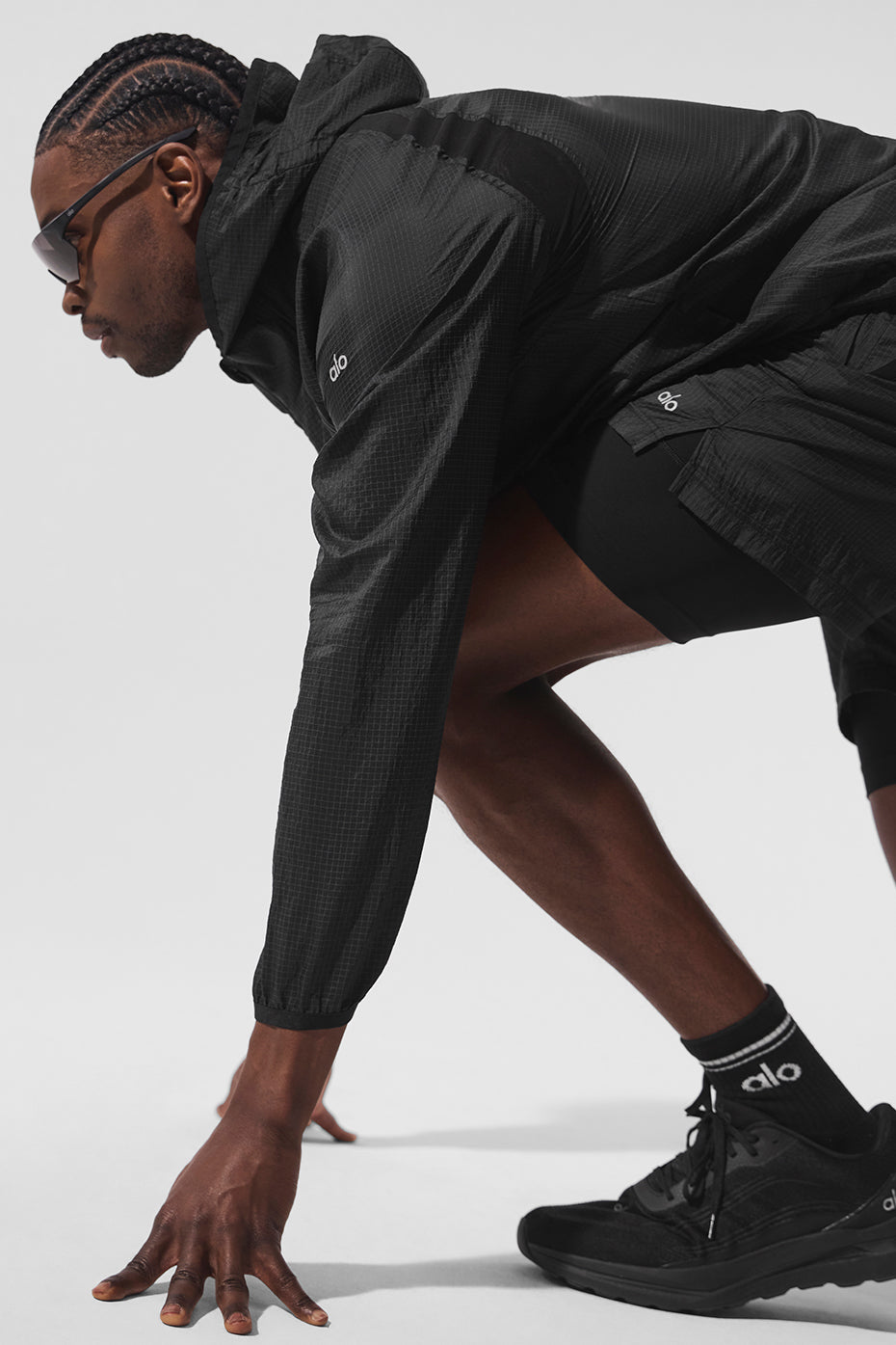 Front view of black lightweight jacket for daily training