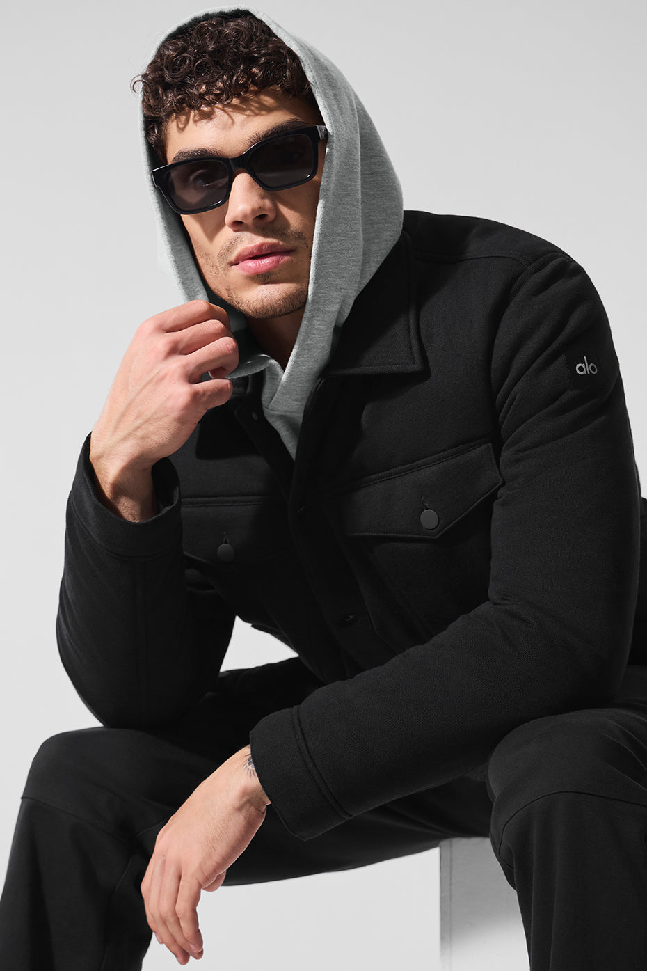 Front view of the Chill Ease Trucker Jacket in black, showcasing its classic design.