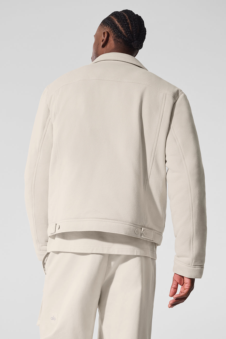 Front view of the Chill Ease Trucker Jacket in Bone, showcasing its sleek design.