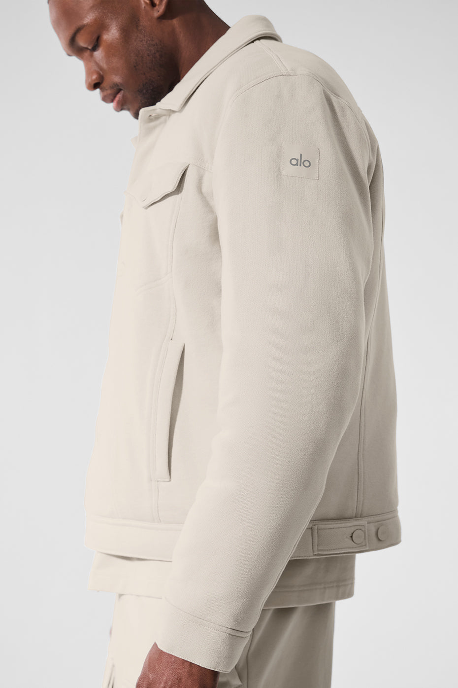 Model wearing the Chill Ease Trucker Jacket in Bone, styled for a casual day out.