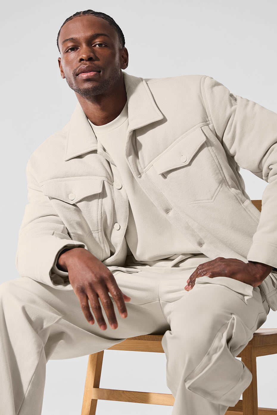 Model wearing the Chill Ease Trucker Jacket in Bone, styled for a casual day out.