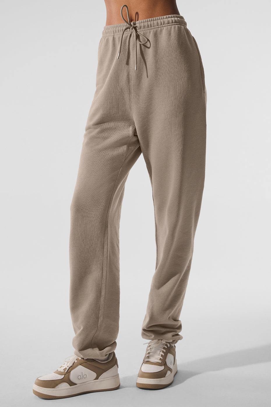 Chill vintage wash sweatpants in gravel color, featuring zippered pockets.