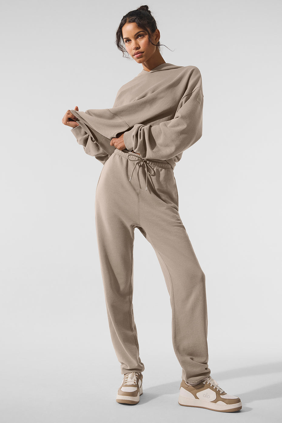 Chill vintage wash sweatpants in gravel color, featuring zippered pockets.