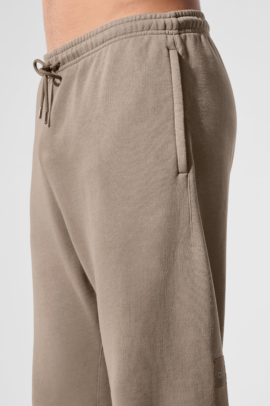 Close-up of gravel wash texture on baggy sweatpants