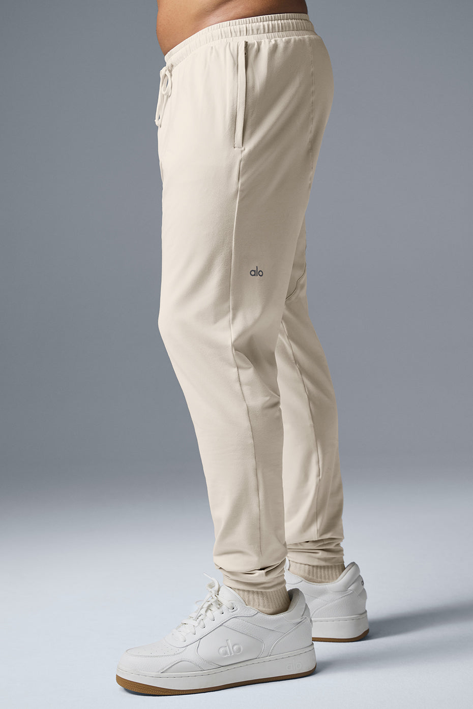 Back view of Urban Revive Yoga Pants in bone color, perfect for yoga classes or casual outings.