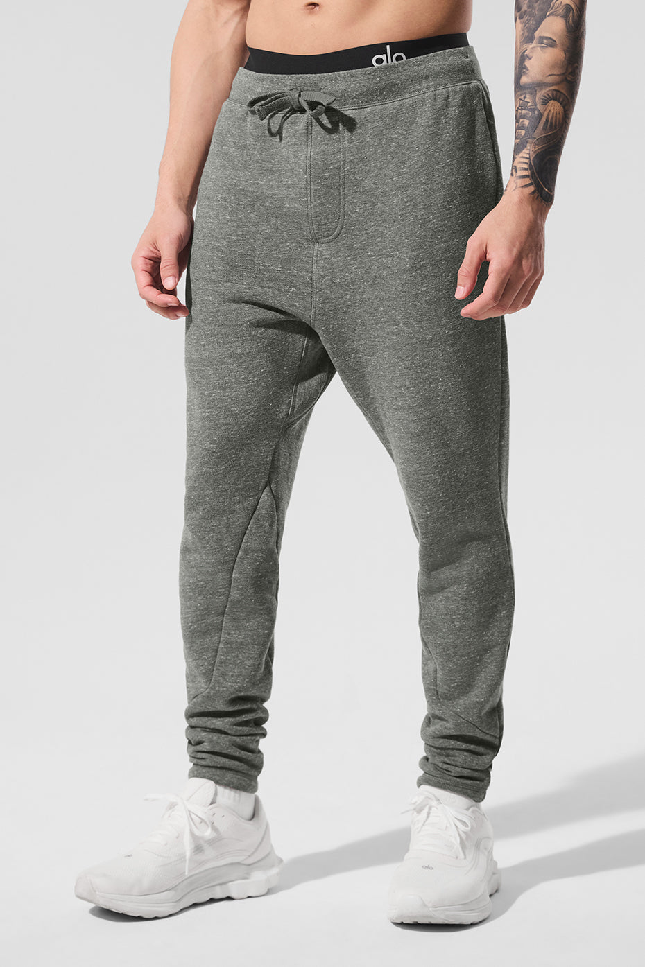 Front view of men's grey triblend sweatpants showing the relaxed fit and drawstring waist