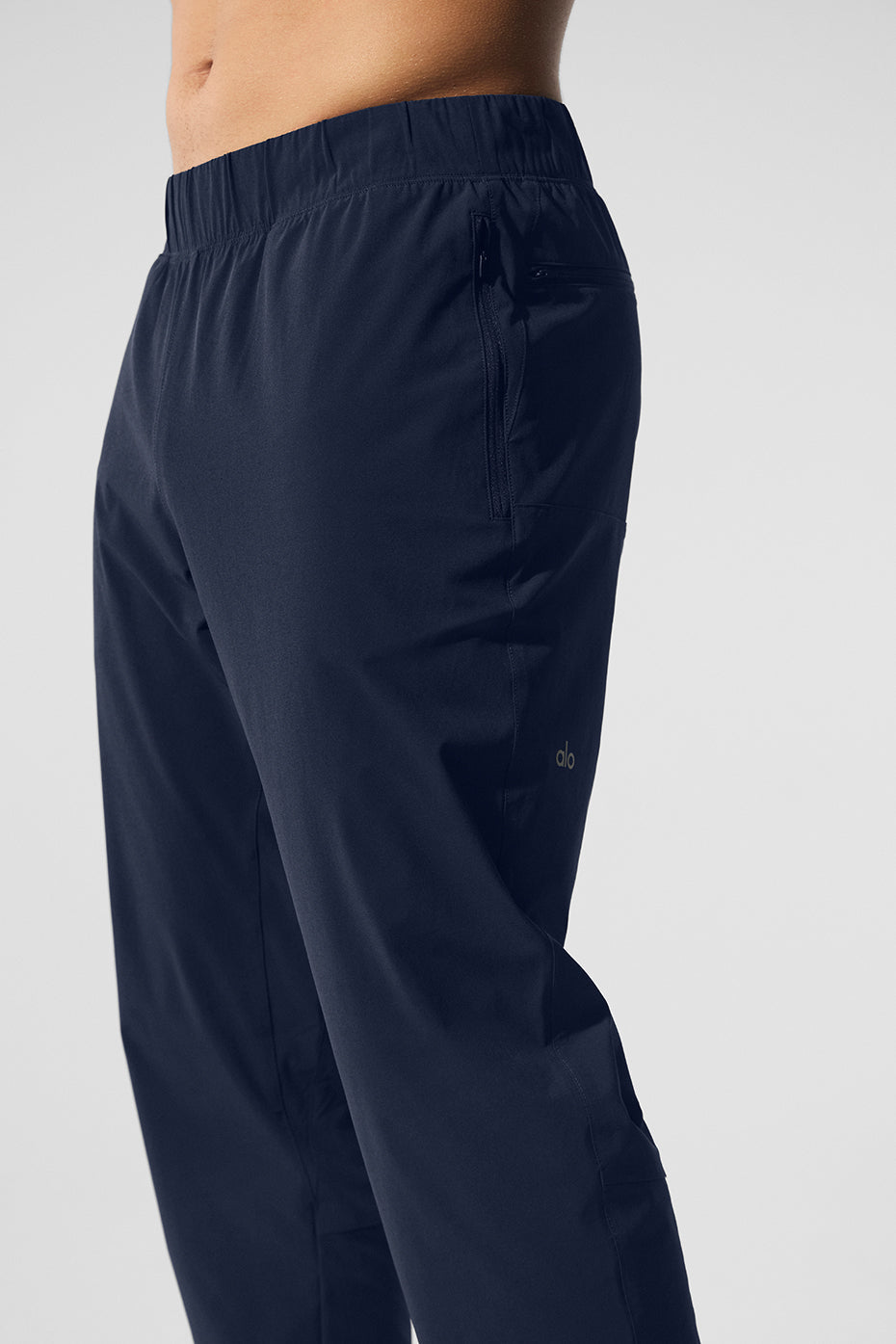 Front view of Elevate Performance Pants in navy, showcasing sleek design.