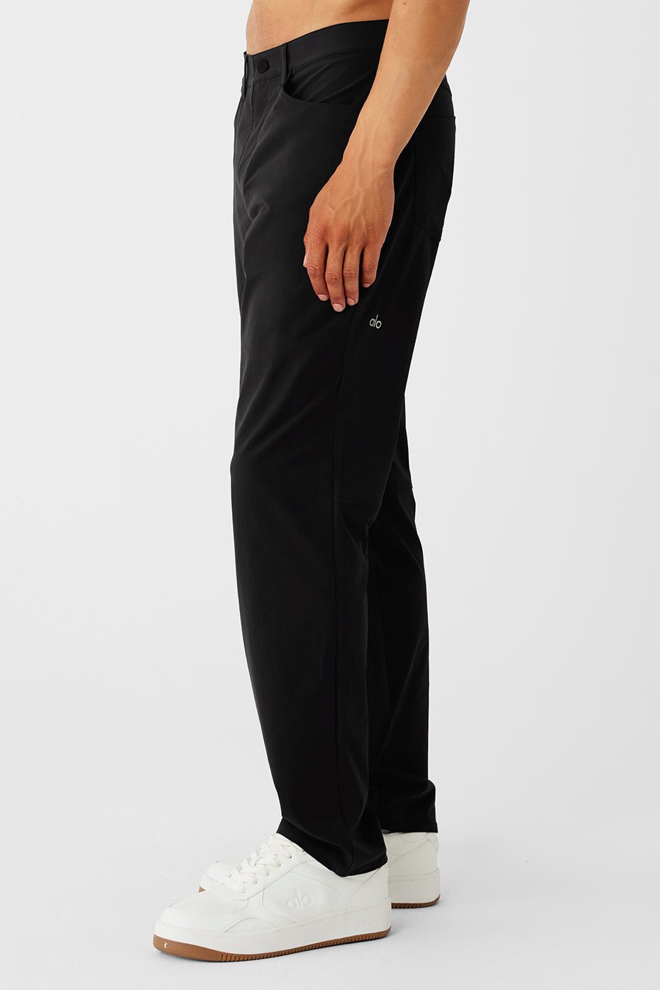 Lifestyle shot of tailored pants women wear while commuting
