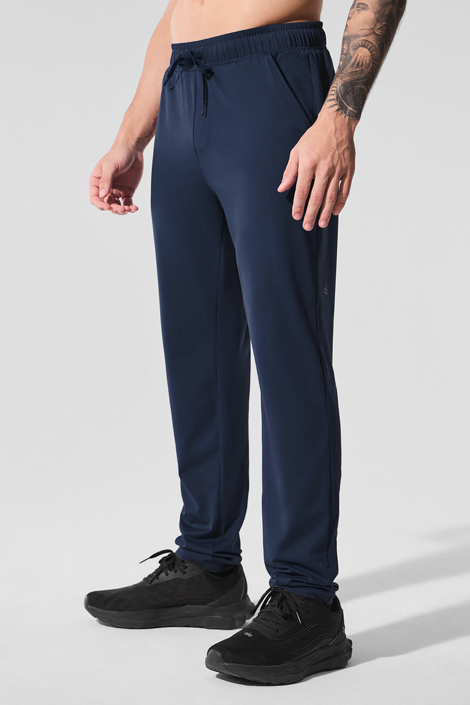 Casual wear scene featuring Conquer Pulse performance pants outdoors