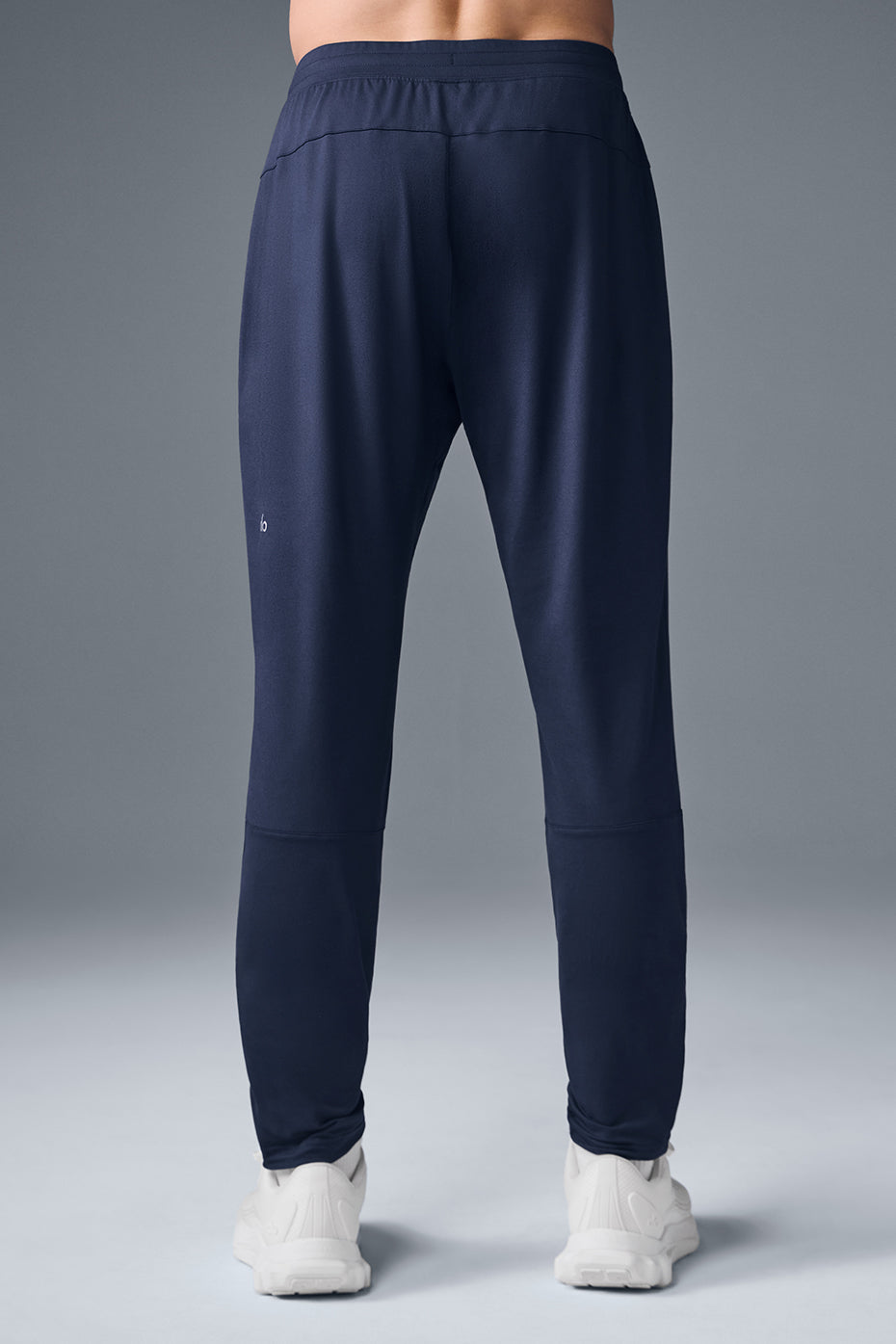 Close-up of breathable fabric and elastic waistband of performance pants