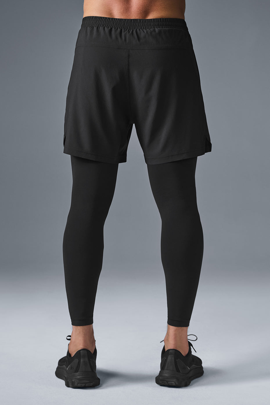 Close-up of the stretchy waistband and internal drawcord of the running pants.