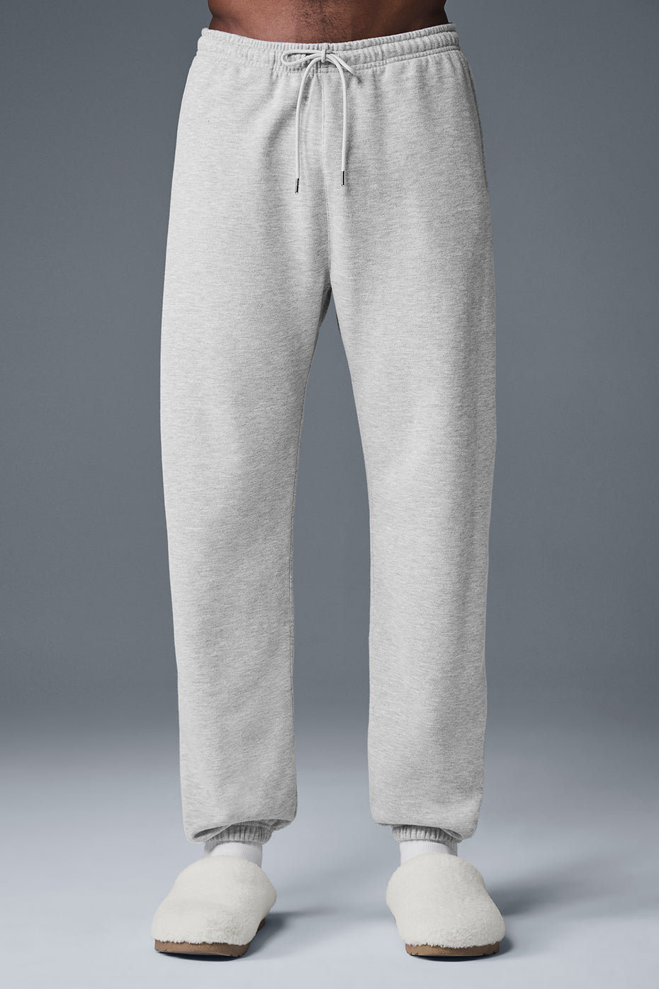 Close-up of camo sweatpants fabric texture and side pocket detail