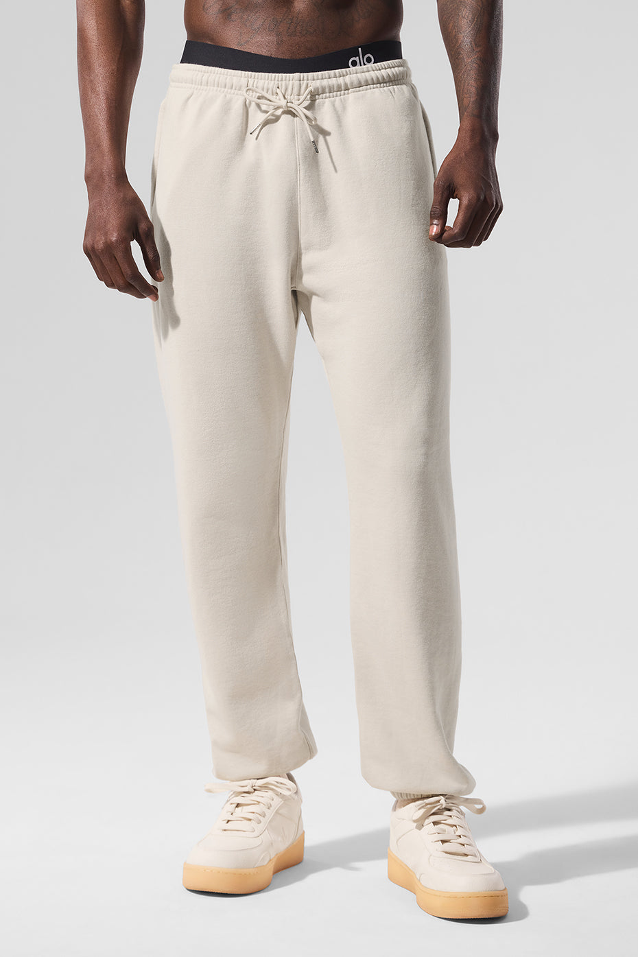 Athleta Chill Sweatpants draped on a chair, showcasing the wide leg design