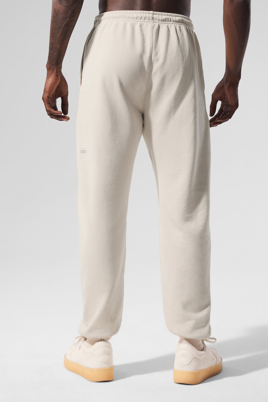 Model wearing the Bone-colored sweatpants with a casual t-shirt