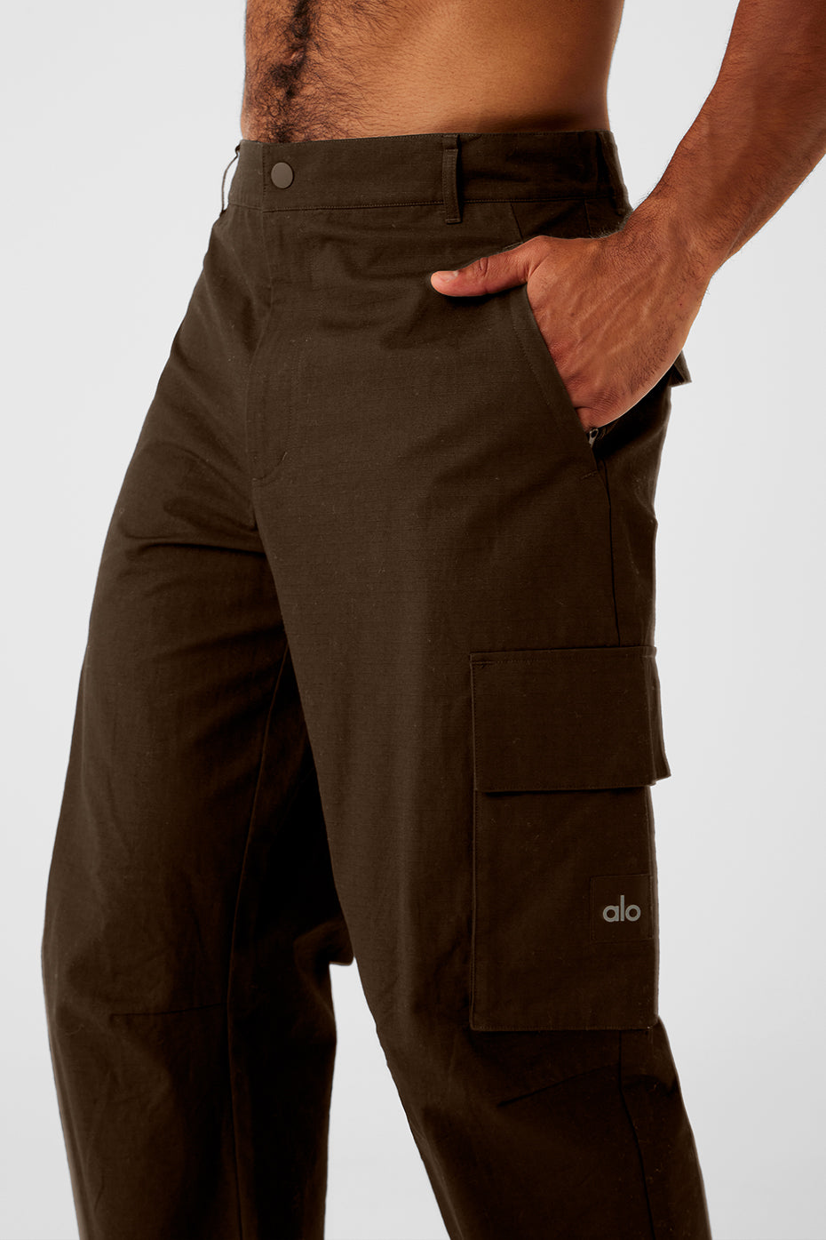 Espresso cargo trousers displayed with streetwear hoodies for a trendy look.