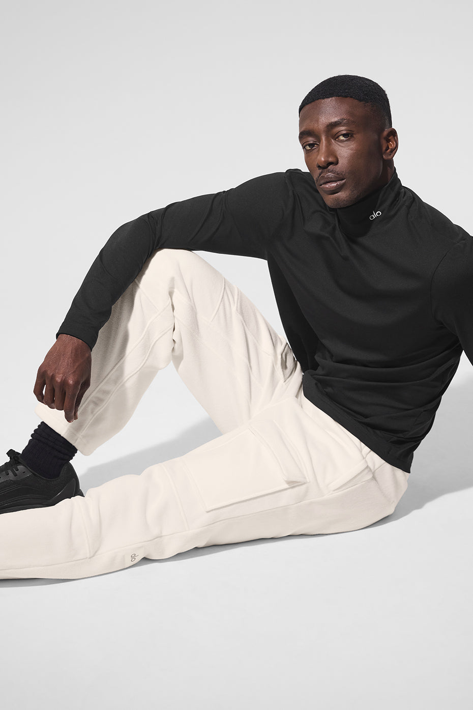 Side view showcasing the mixed media knee pads of cargo pants