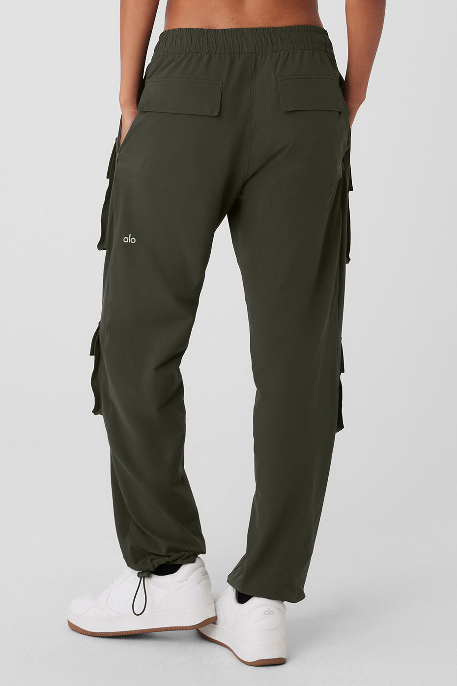 Side-angle showing zip cargo pocket and water-resistant material