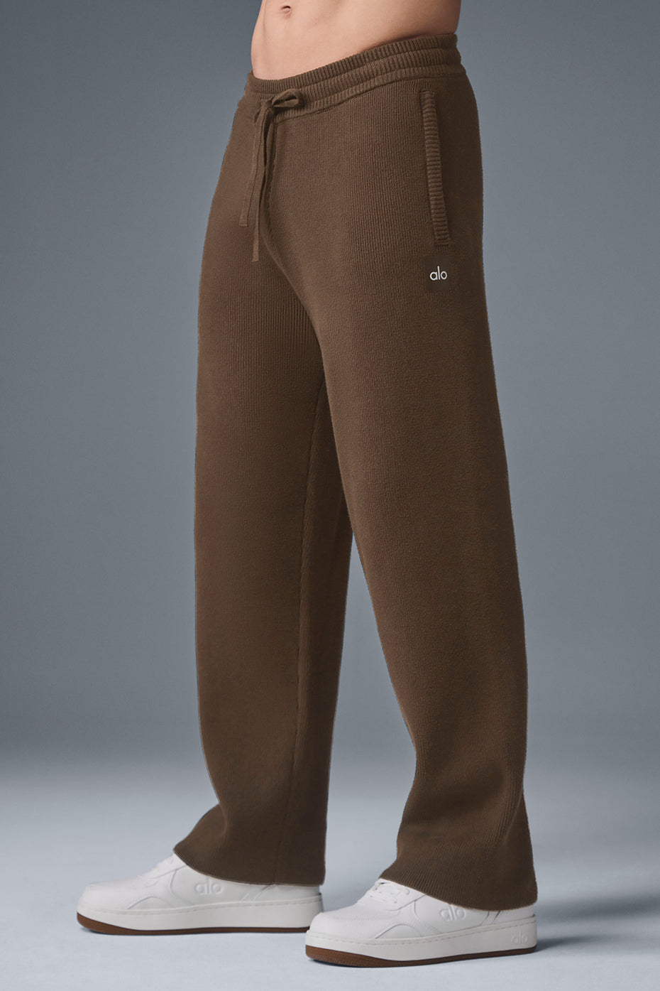 Model wearing camo sweatpants for casual streetwear looks