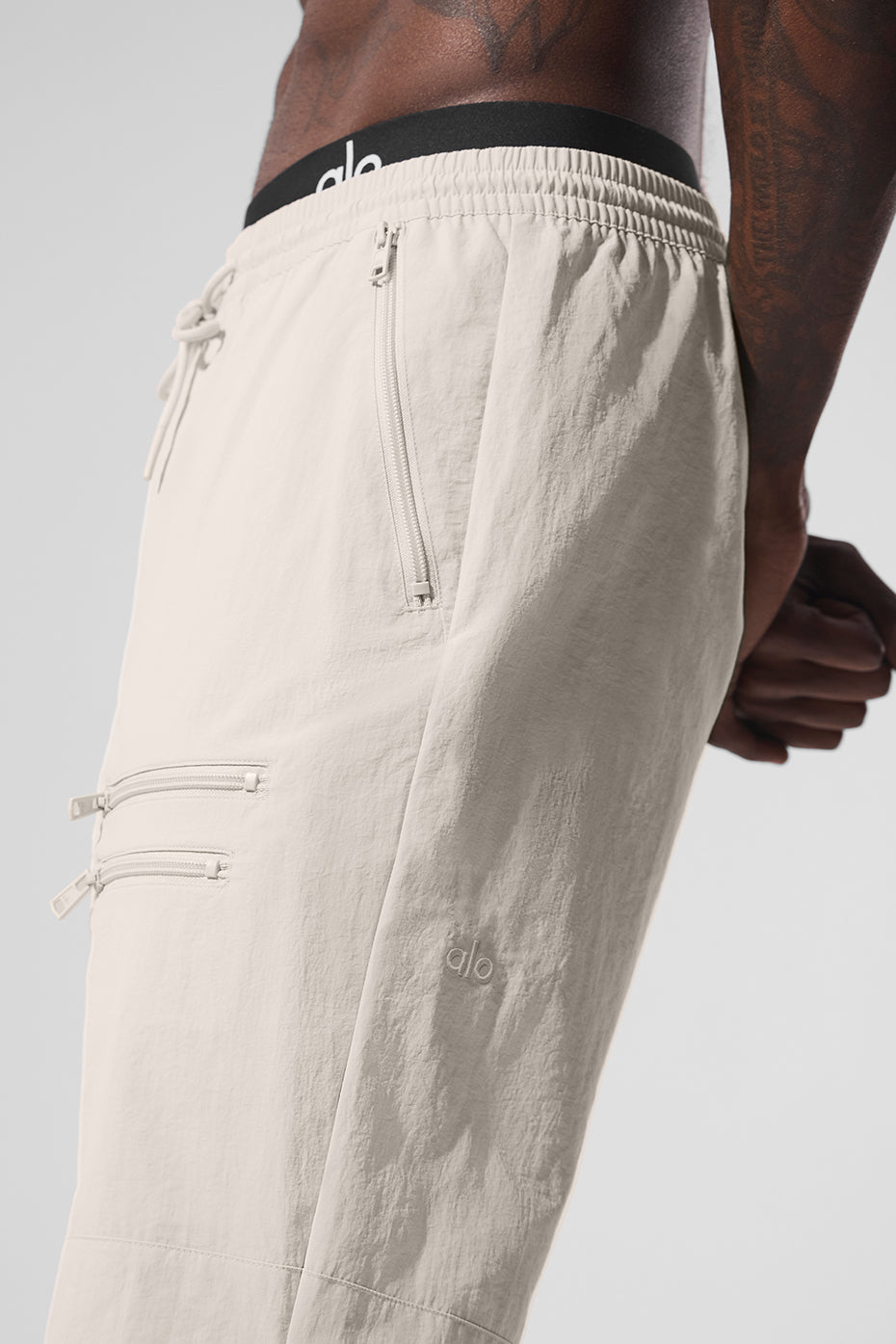 Close-up of the adjustable bungee hem on joggers for women.