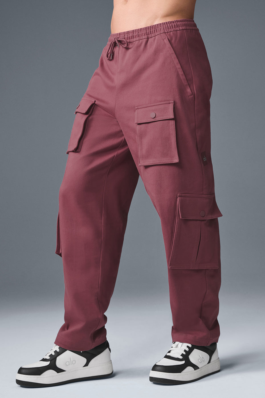 Close-up of snap closures on Burgundy Truffle Cargo Pants.