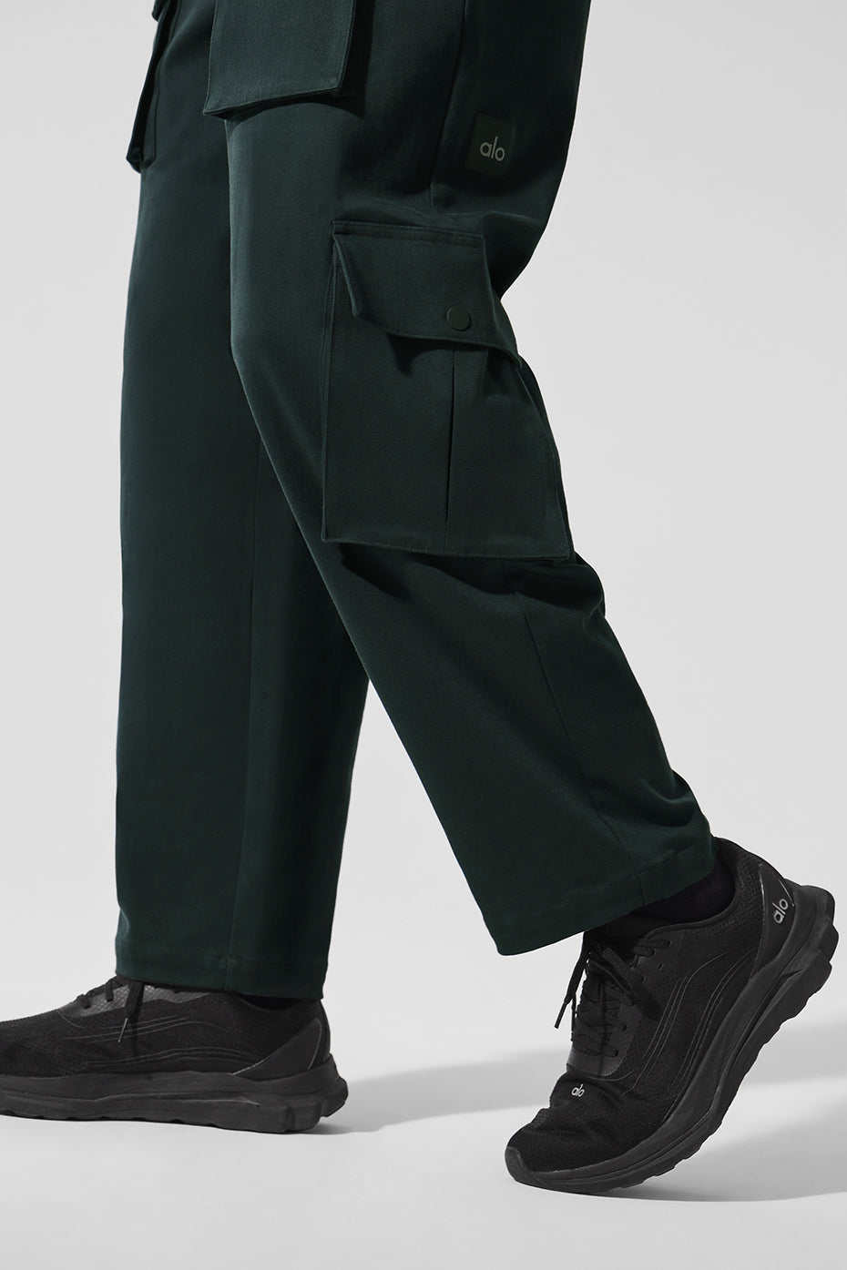 Charcoal Green cargo pants showcasing the elastic waist and drawstring.