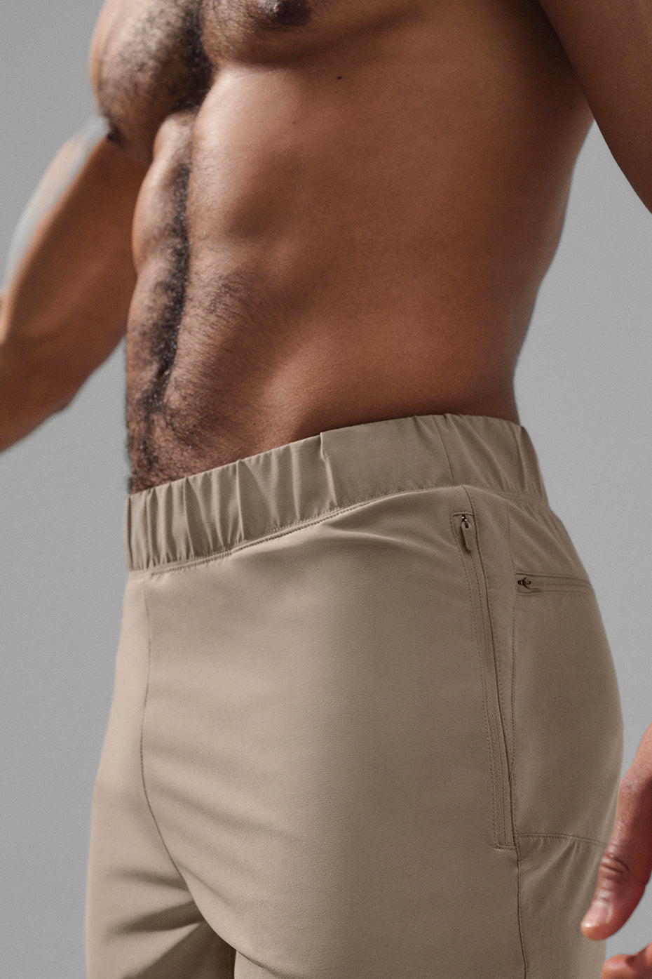 Front view of Elevate Performance Pants in Gravel, showcasing sleek design.