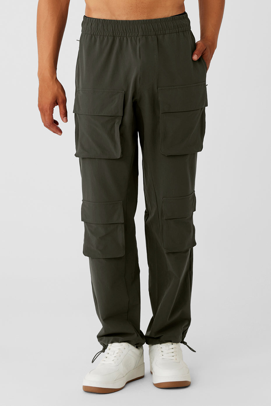Close-up of men's water repellent pants highlighting cargo pockets and stitching detail
