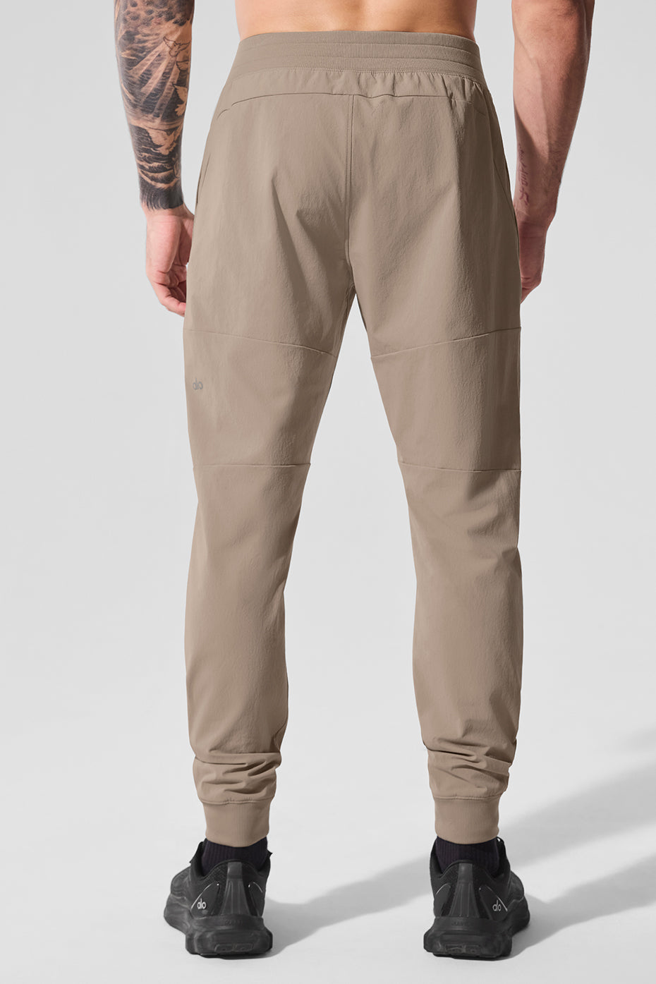 Close-up of water-repellent pants featuring an elastic waistband.