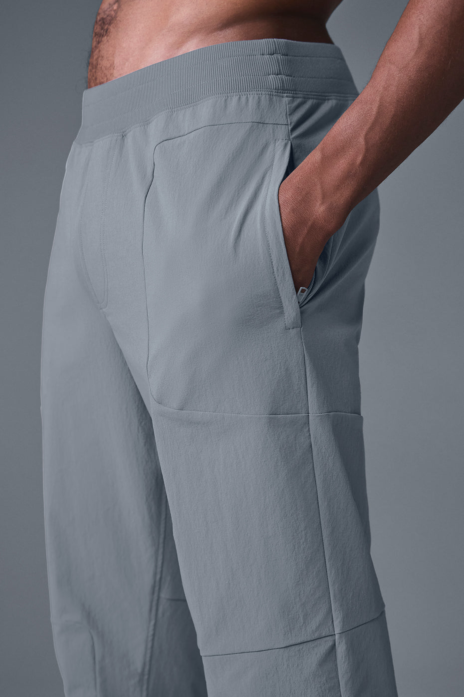 Close-up of water-repellent fabric texture on mens performance pants