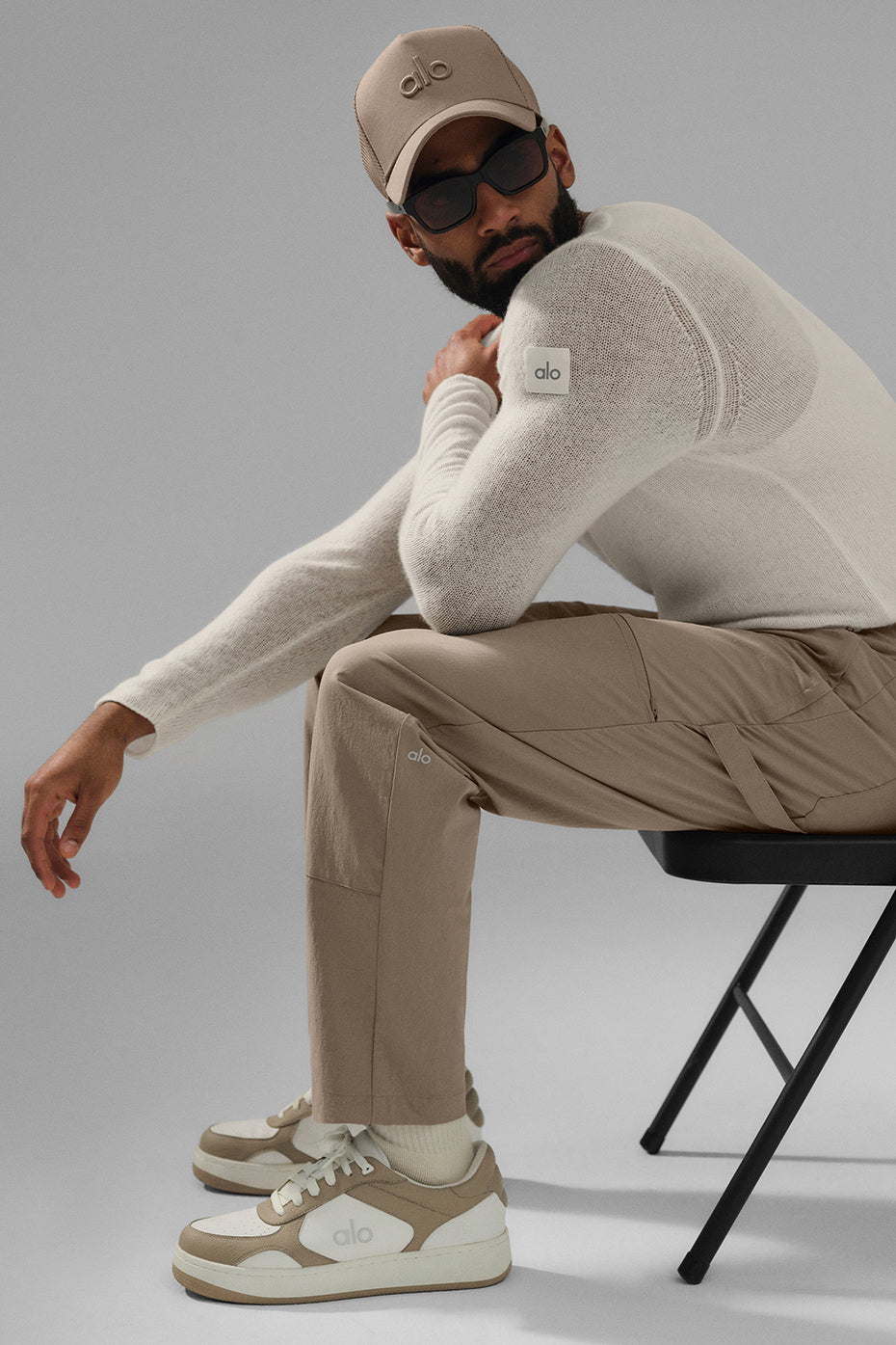 Side view of carpenter pants showing cargo pockets and zippered detail.