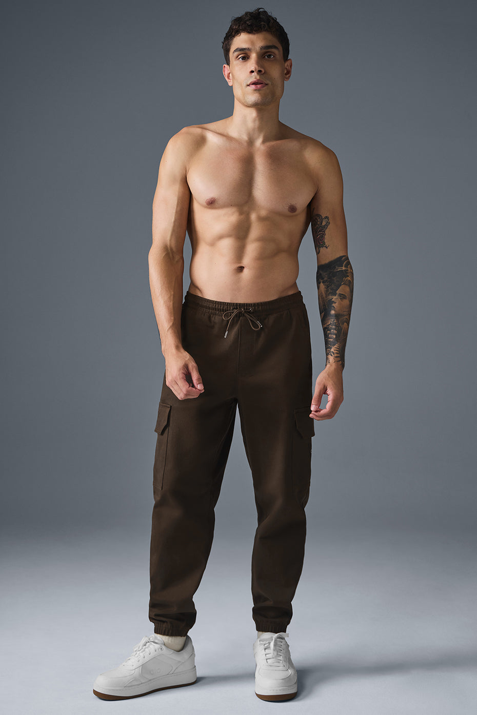 Side view of sueded joggers showcasing roomy pockets.