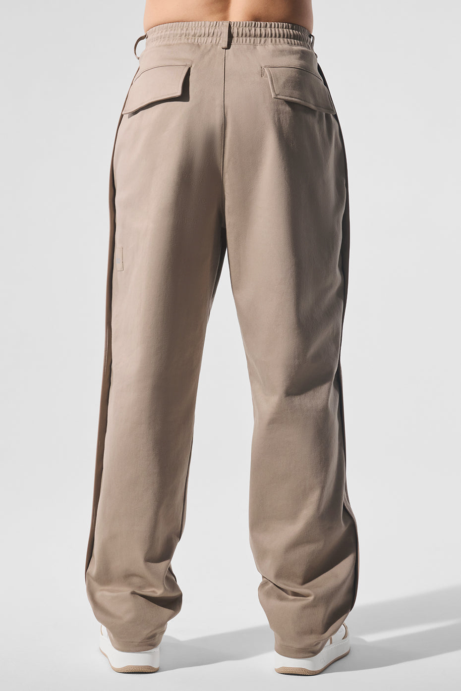Model wearing gravel straight leg pants, perfect for casual outings.