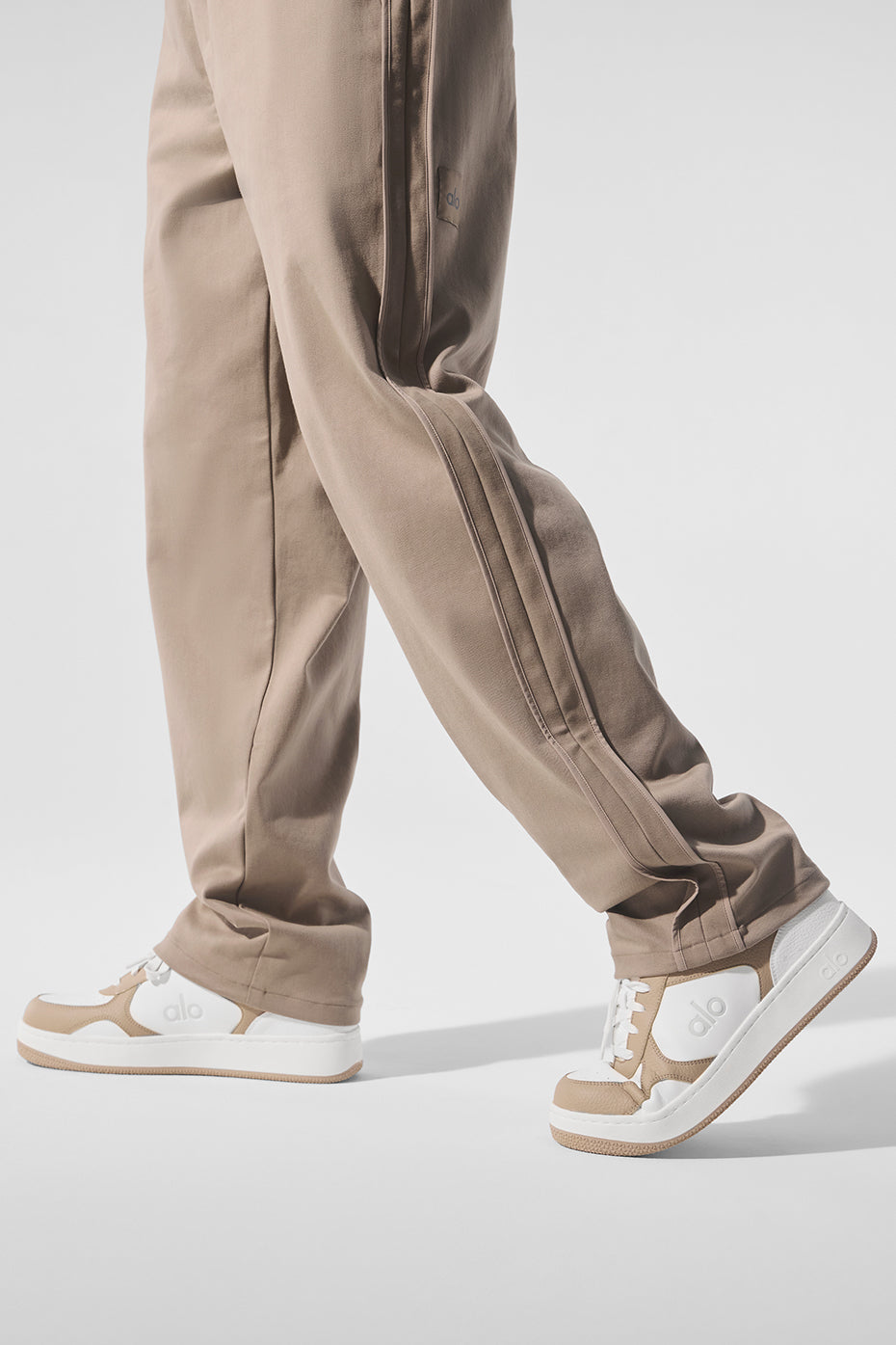Close-up of the gravel sueded straight leg pants fabric and details.