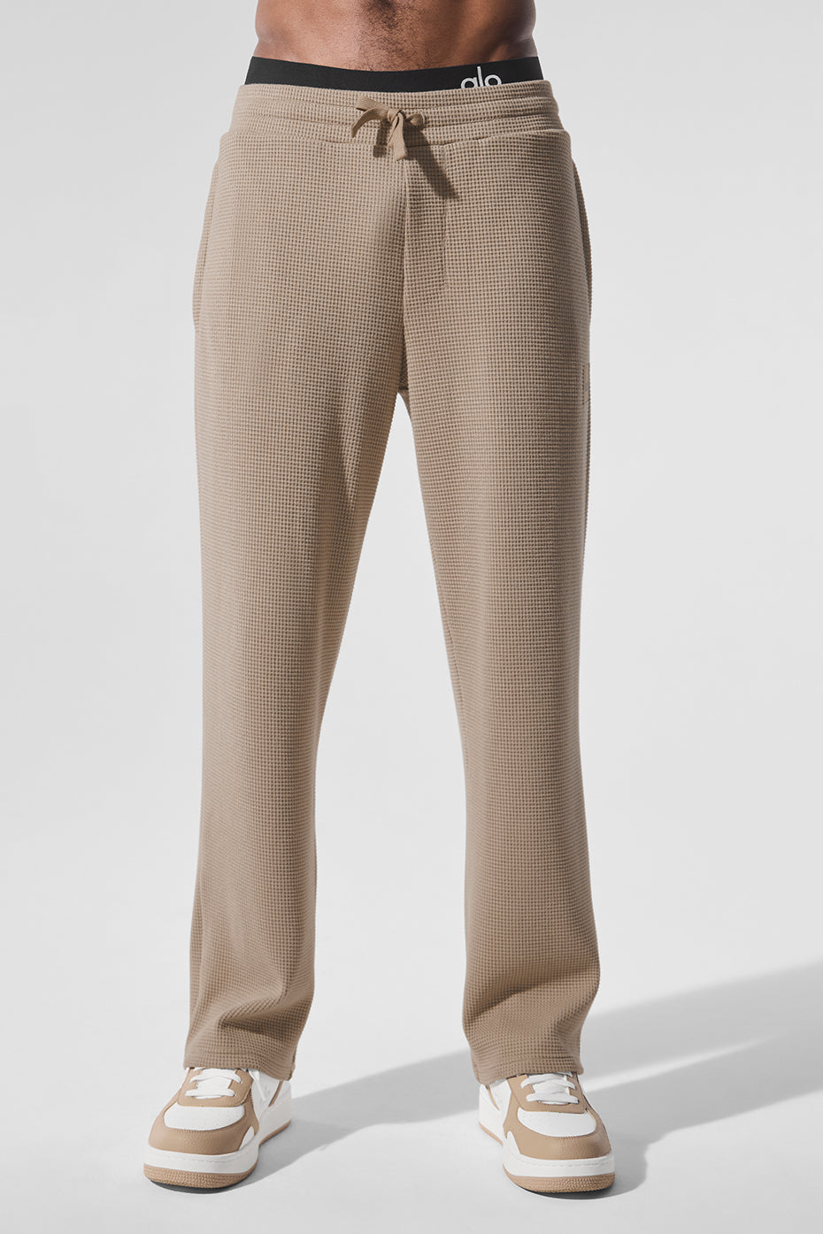 Front view of Elevate waffle straight leg pants in gravel color showing the relaxed fit